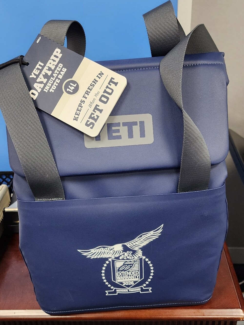 Yeti Navy Blue Roll-Top Backpack with Gray Straps